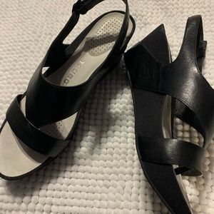 Black leather wedge sandals